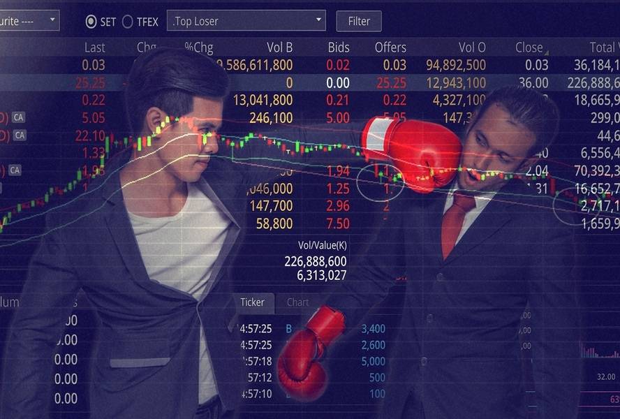 טסטוסטרון בשוק המניות - גבר צעיר חוטף אגרוף על רקע נתוני שוק המניות